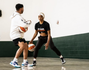 Justin Razooky training WNBA player Dijonai Carrington