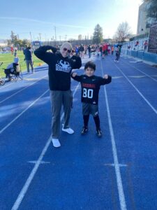 Michelle Toy with one of her youth athletes